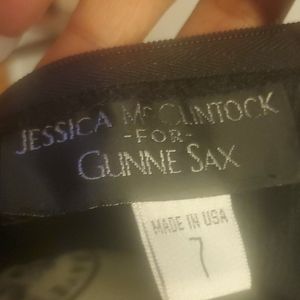 Cute evening dress with ruffles on one side.